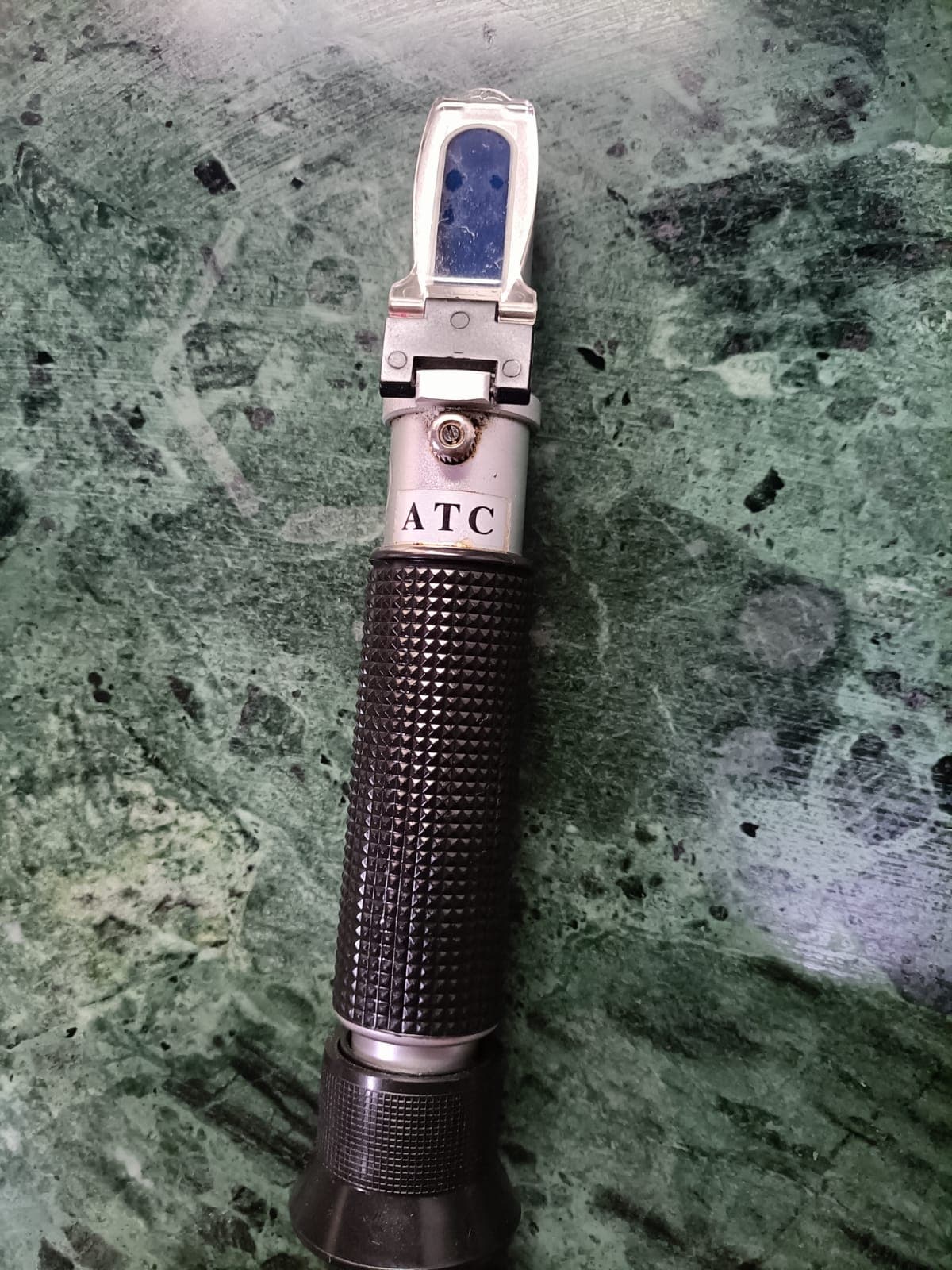 Supplied hand refractometer for checking coolant concentration