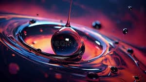 A drop falling into a clear fluid surface